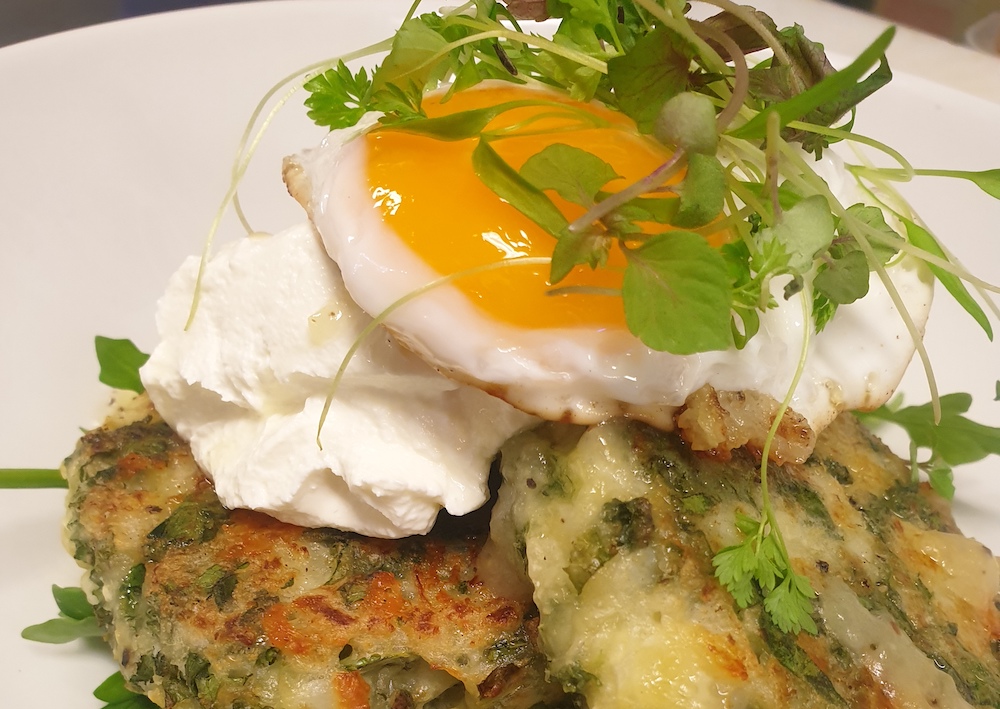 Cauliflower, Kale & Parmesan Fritters with a poached egg