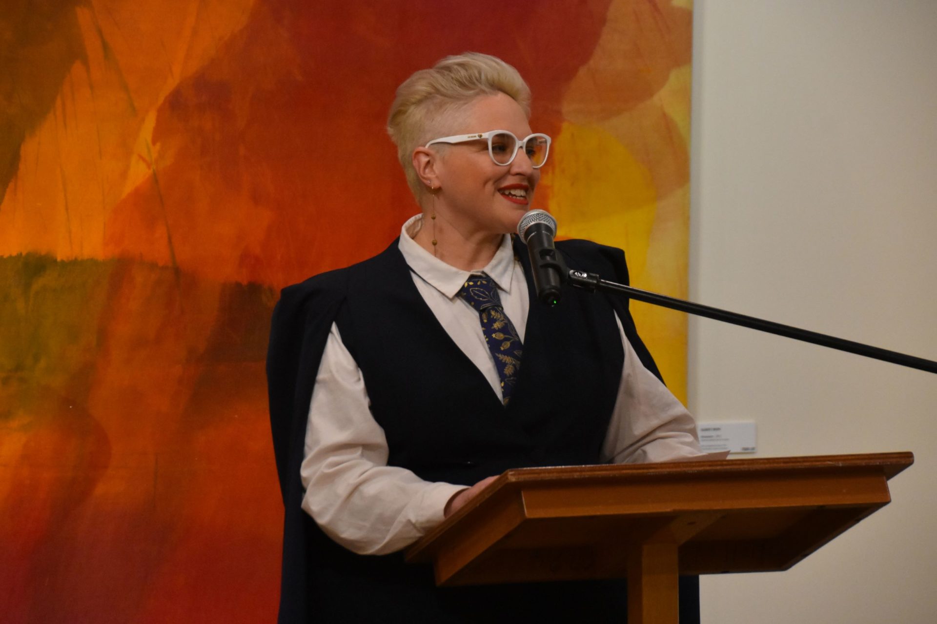 Rachael Parsons speaking at a lectern