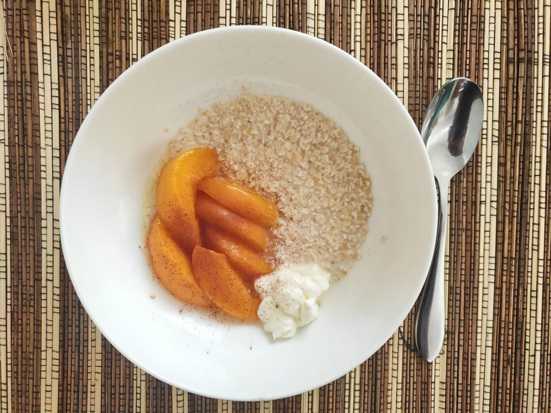bowl of oats with peaches